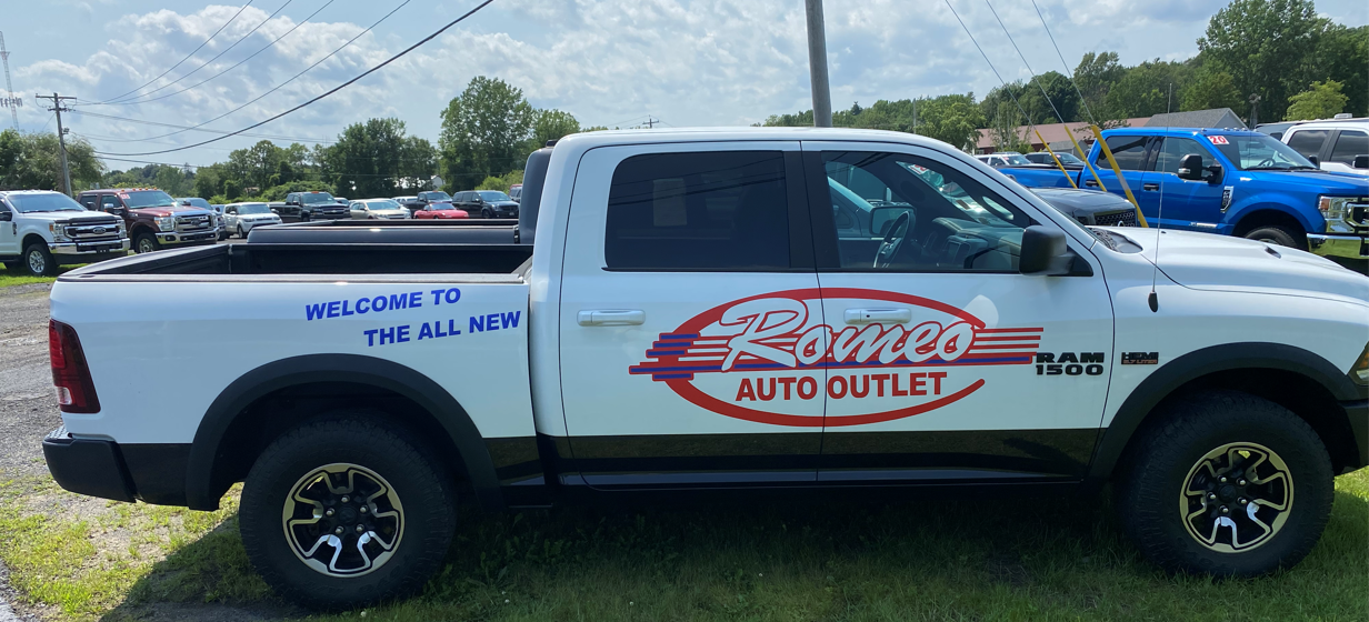 Romeo Auto Outlet Sign
